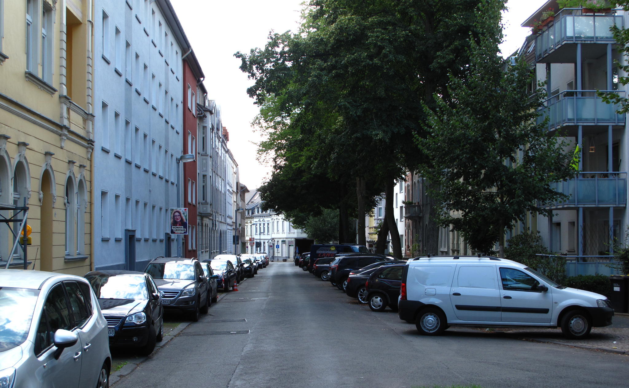 Open-air retail and dining district at dusk